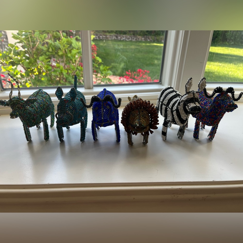 Six different Handcrafted wire/beaded figurines. See pictures, different colors